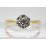 A vintage 18ct gold diamond flower cluster ring, set with estimated approx 0.25cts of brilliant