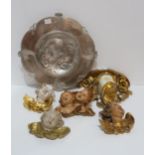 A collection of resin and gilt cherub wall plaques and an Art Deco style resin and gilt wall