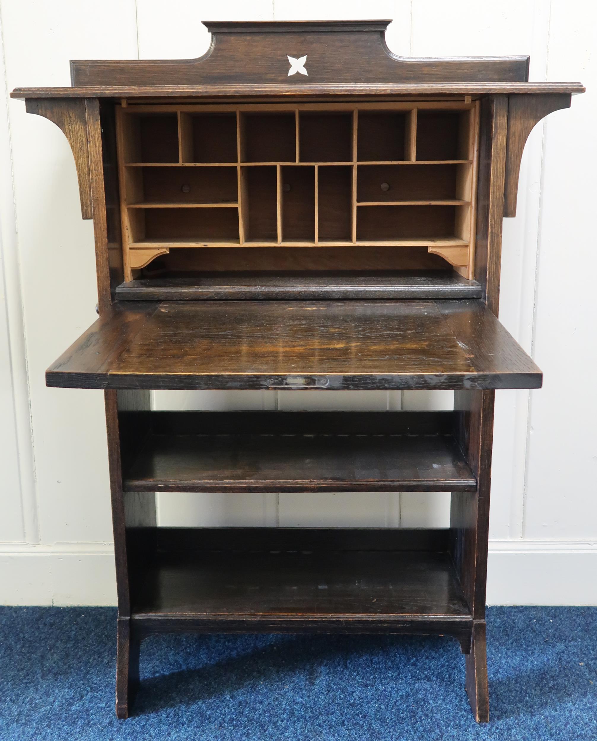 A 20th century oak arts and crafts fall front writing bureau and an oak drop end two door side - Image 2 of 3