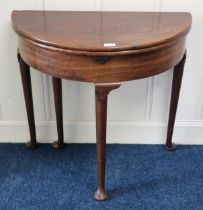 A 20th century mahogany demi lune fold over table Condition Report:Available upon request