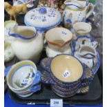 A collection of Quimper pottery including quaich's, jugs etc Condition Report:Not available for this