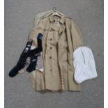 A Burberry trench coat, size 56, with cover, and Burberry and Acquascutum socks Condition Report:Not