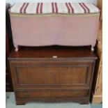 A 20th century mahogany blanket chest, Lloyd loom style wicker hamper, and two 20th century coffee