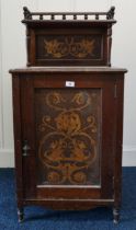 A Victorian oak music cabinet with inlaid pokerwork panels Condition Report:Available upon request