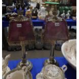 A pair of Sherwood Birmingham chromed oil lamps with fringed shades Condition Report:Available