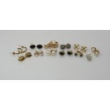 A collection of 9ct and yellow metal gem and pearl set earrings, weight together 9.6gms Condition