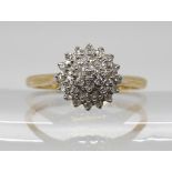 A 9ct gold diamond cluster ring, set with estimated approx 0.15cts of eight cut diamonds, finger