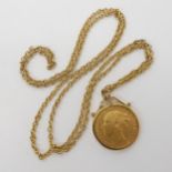 An 1873 gold full sovereign in a 9ct gold pendant mount with a gold plated chain. Weight of the
