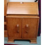 A 20th century oak writing bureau Condition Report:Available upon request