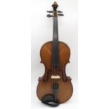 A two piece back violin 35.5cm with label to the interior Beare and Son London with bow and case