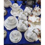 A Royal Albert Silver Maple patter tea service comprising teapot, cups, saucers, plates cake