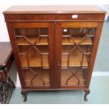 A 20th century mahogany astragal glazed two door bookcase Condition Report:Available upon request