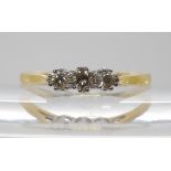 An 18ct gold three stone diamond ring of estimated approx 0.30cts, finger size S1/2, weight 2.8gms