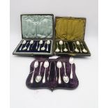 A cased set of silver coffee spoons and sugar tongs, with engraved decoration to the terminal and