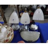 Three chromed table lamps and a wall light Condition Report:Available upon request
