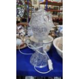 A crystal lamp and shade Condition Report:Available upon request