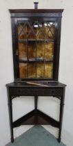 A Victorian glazed corner cabinet and a 20th century oak coat stand (2) Condition Report:Available