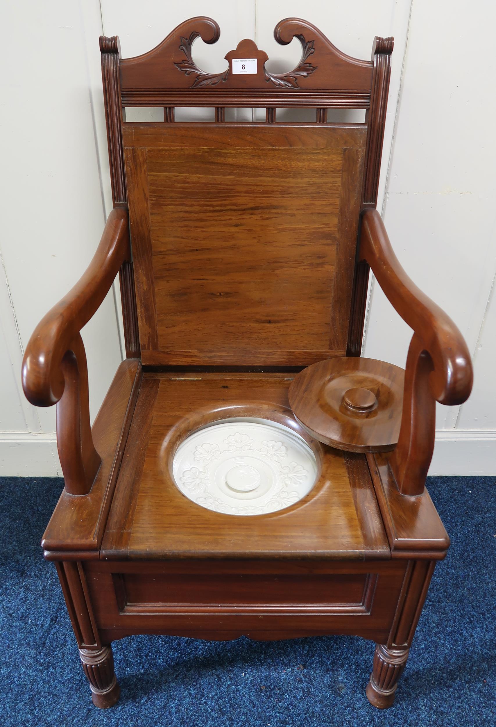 An early 20th century mahogany commode armchair with ceramic pot interior Condition Report:Available - Image 2 of 2