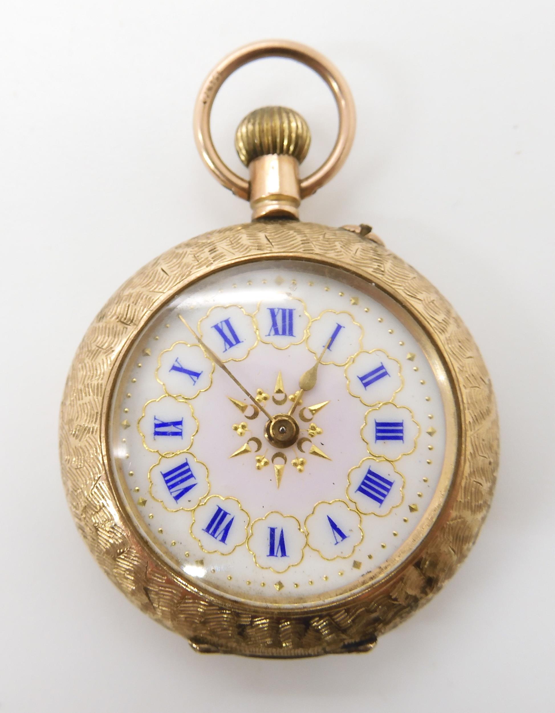 A 9ct fob watch with decorative enamelled dial inner dust cover with full Swiss hallmarks, weight