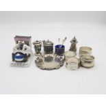 A collection of silver including a silver pin dish with chippendale style pie crust rim, by Mappin &