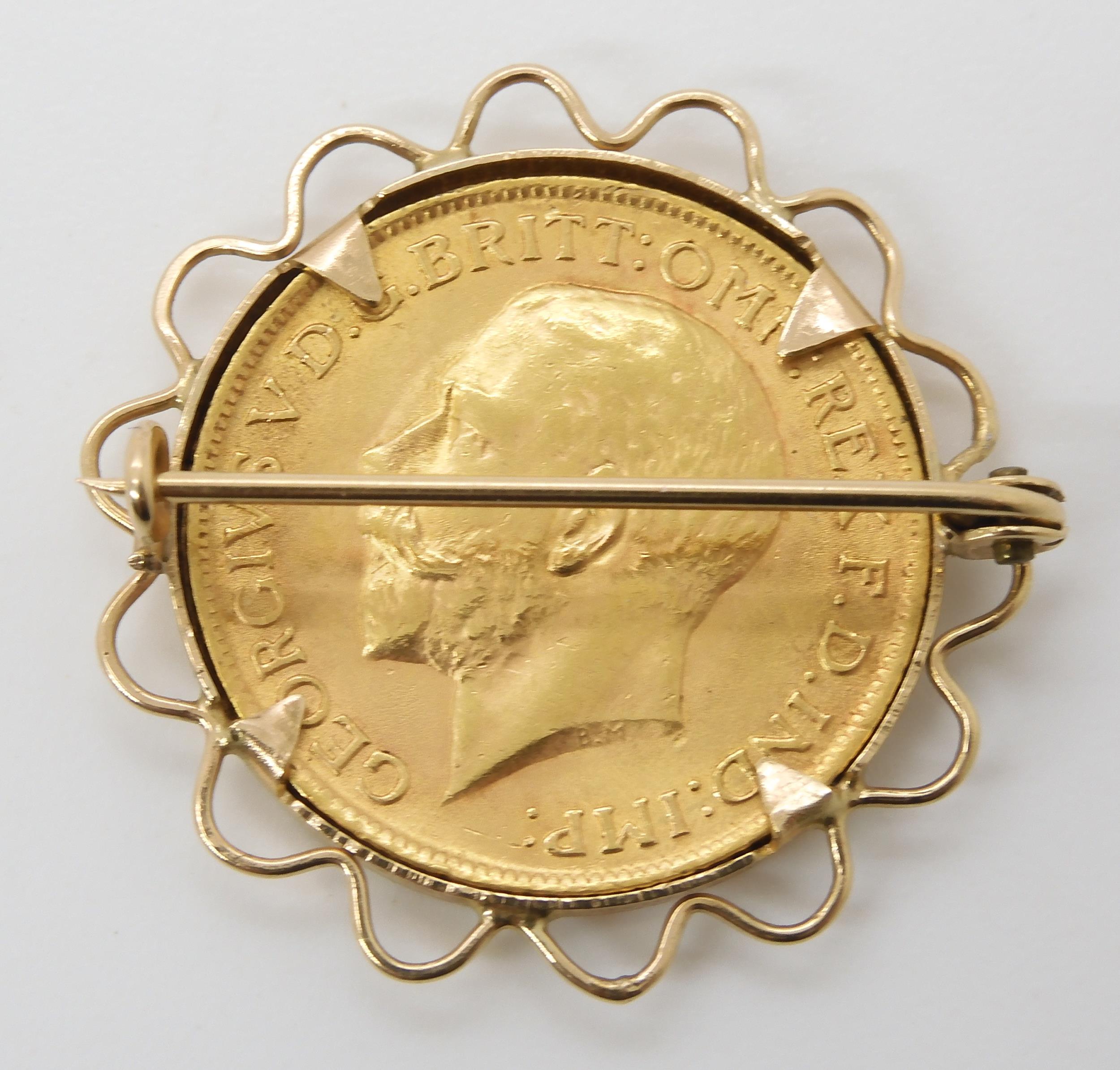 A 1911 gold full sovereign in a 9ct brooch mount, weight 9.7gms Condition Report:Available upon - Image 2 of 2