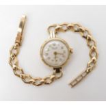 A 9ct gold Precista ladies watch, weight including mechanism 17.6gms Condition Report:Available upon