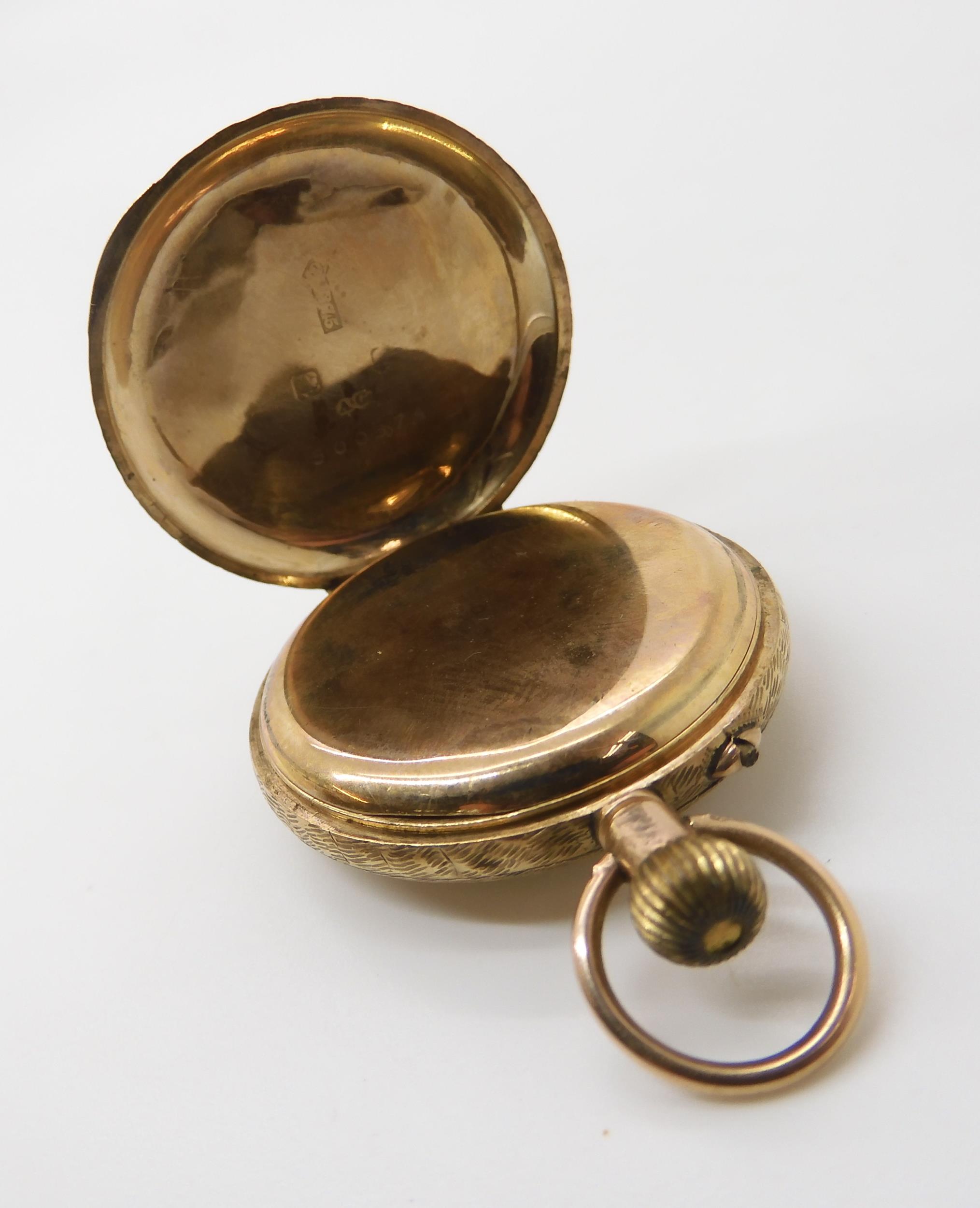 A 9ct fob watch with decorative enamelled dial inner dust cover with full Swiss hallmarks, weight - Image 3 of 4