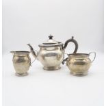 A George V bachelors Scottish silver tea service, comprising tea pot, sugar bowl and cream jug, of
