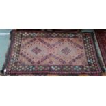 A lot of three assorted tribal rugs (3) Condition Report:Available upon request