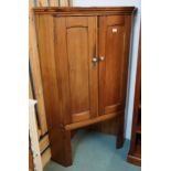 A 20th century pine two door corner cabinet Condition Report:Available upon request