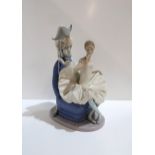 A large Nao 'Dream Come True' figure of a seated ballerina with a jester behind, 28cm high Condition