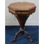 A Victorian rosewood trumpet form sewing/work table with octagonal hinged lid concealing fitted