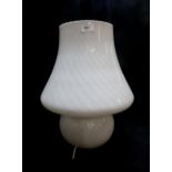 A 20th century Murano style Mushroom lamp, blown from one piece, the body with wrythen decoration,