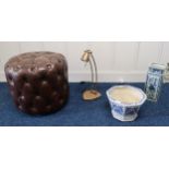 A contemporary leather buttoned footstool, spoon back parlour chair, modern table lamp and a blue