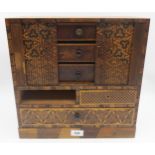 A miniature marquetry cabinet, geometric design also applied to the horizontal tambour doors (36cm x