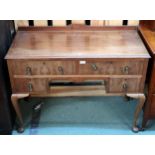 A 20th century mahogany and walnut veneered dressing table Condition Report:Available upon request