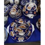 A Royal Albert Heirloom pattern tea service comprising teapot, six cups, saucers, plates and cake