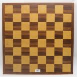 A large tournament size chess board, made in England 53cm x 53cm Condition Report:Available upon