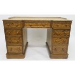 A VICTORIAN MAHOGANY HOBBS & CO INVERTED BREAKFRONT TWIN PEDESTAL DESK with central drawer flanked