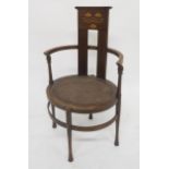A LATE VICTORIAN ARTS AND CRAFTS J.S. HENRY MAHOGANY FRAMED ARMCHAIR with inlaid splat, curved