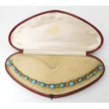 A TURQUOISE & DIAMOND DOUBLE BROOCH converted from a necklet, it now has brooch fittings to each end