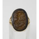 AN OF THE ANTIQUE GLASS INTAGLIO depicting a Bacchanalian scene, dimensions 21.5mm x 15.6mm, in a