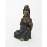 A CHINESE GILT BRONZE MODEL OF GUANYIN seated in flowing robes and in Akash mudra, 24cm high