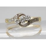 A VINTAGE 18CT & PLATINUM THREE STONE DIAMOND RING set with estimated approx 0.20cts of old cut