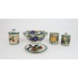 A WEMYSS FRUIT DRAINER AND BOWL painted with the plum pattern, the bowl with two ring handles and