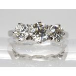A PLATINUM THREE STONE DIAMOND RING set with estimated approx 1.90cts of old cut diamonds