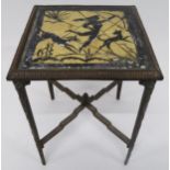 AN AMERICAN CAST IRON ART DECO SIDE TABLE with a glass inset top depicting Diana the huntress on