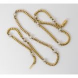 A NATURAL PEARL SET CHAIN the bright yellow metal snake chain, is interspaced with natural pearls of