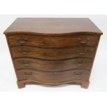 A GEORGIAN MAHOGANY SERPENTINE FRONT CHEST OF DRAWERS with four graduating drawers on bracket