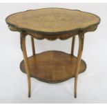 A VICTORIAN KINGWOOD AND MARQUETRY INLAID TWO TIER TABLE with brass mounts to edges and supports,